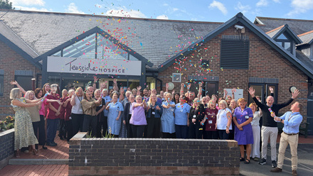 The+Teesside+Hospice+team+celebrate+their+Outstanding+rating.jpg