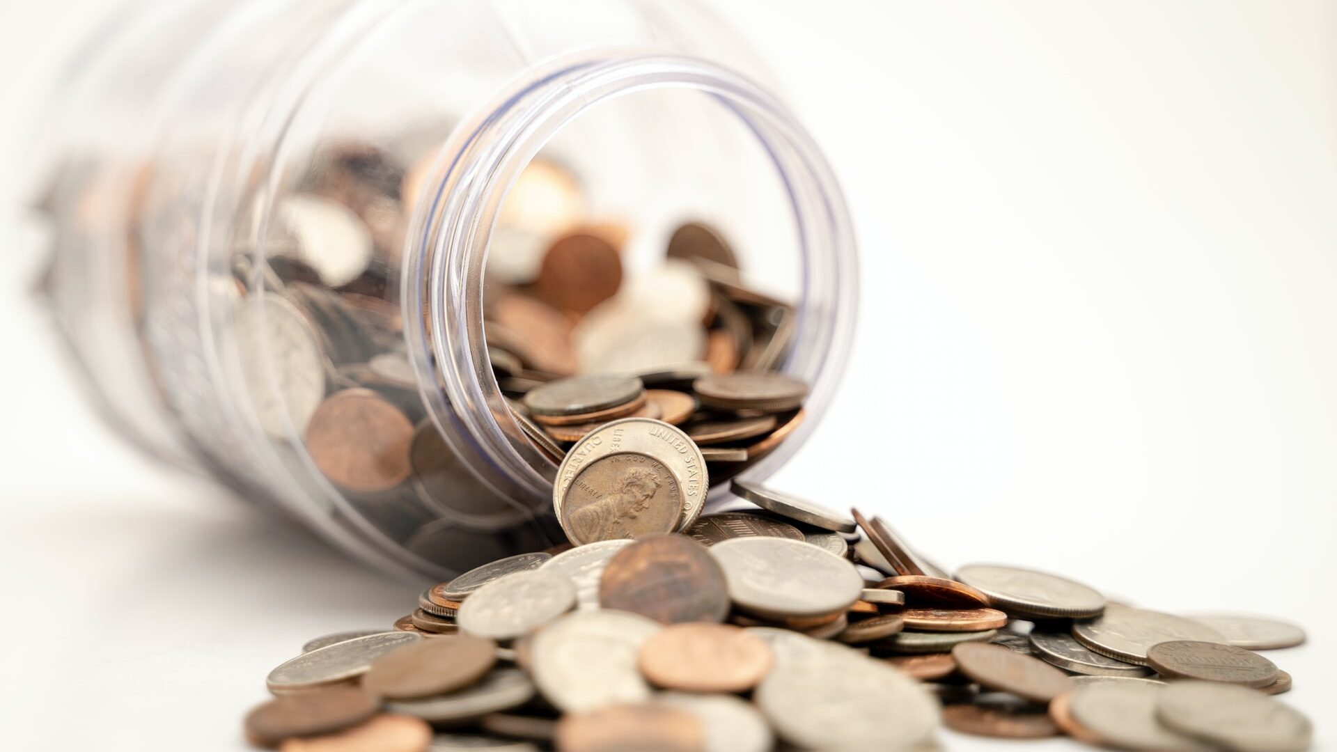 money falling out of a jar